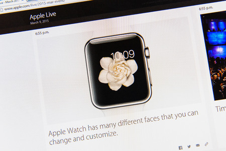 PARIS, FRANCE - MAR 9, 2015: Apple Computers event keynote tweets close up seen on iMac display featuring many faces of Apple Watch to customize as seen on 9 March, 2015のeditorial素材