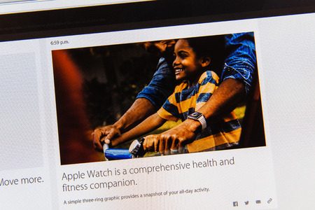 PARIS, FRANCE - MAR 9, 2015: Apple Computers event keynote tweets close up seen on iMac display informing about the advantages of Apple Watch as seen on 9 March, 2015のeditorial素材