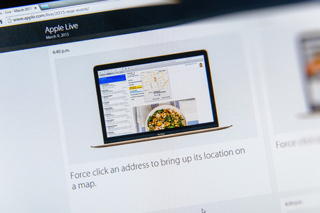 PARIS, FRANCE - MAR 9, 2015: Apple Computers event keynote tweets close up seen on iMac with the newly launched MacBook and Force Click to bring on location on a a map as seen on 9 March, 2015のeditorial素材
