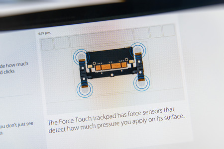 PARIS, FRANCE - MAR 9, 2015: Apple Computers event keynote tweets close up seen on iMac with the newly launched MacBook Retina trackpad - Force Touch, as seen on 9 March, 2015のeditorial素材