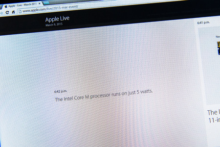 PARIS, FRANCE - MAR 9, 2015: Apple Computers event keynote tweets close up seen on iMac withfacts about the new Intel core M processor running only on 5 watt as seen on 9 March, 2015のeditorial素材