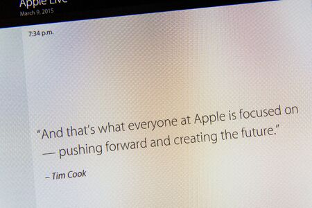 PARIS, FRANCE - MAR 9, 2015: Apple Computers event keynote tweets close up seen on iMac display with quote from Tim Cook speech about Apple creating futureのeditorial素材