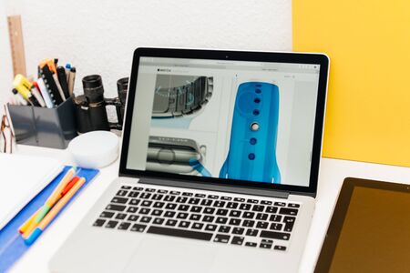 PARIS, FRANCE - MAR 10, 2015: Apple Computers website on MacBook Retina in room environment showcasing newly launched Apple Watch section on site as seen on 10 March, 2015のeditorial素材
