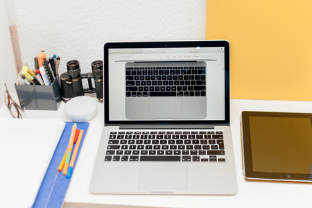 PARIS, FRANCE - MAR 10, 2015: Apple Computers website on MacBook Retina in room environment showcasing new Apple keyboard on a MacBook laptop as seen on 10 March, 2015 with tilt-shift lensのeditorial素材