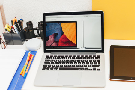 PARIS, FRANCE - MAR 10, 2015: Apple Computers website on MacBook Retina in room environment showcasing MacBook thin specs as seen on 10 March, 2015 with a tilt-shift lensのeditorial素材