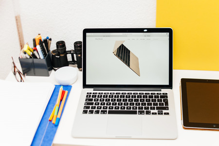 PARIS, FRANCE - MAR 10, 2015: Apple Computers website on MacBook Retina in room environment showcasing newly launched MacBook as seen on 10 March, 2015のeditorial素材