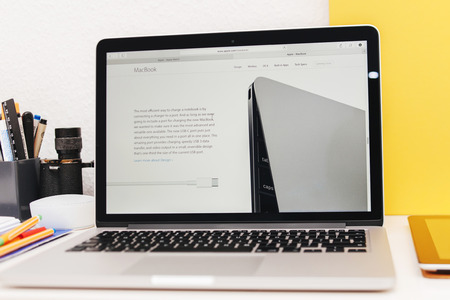 PARIS, FRANCE - MAR 10, 2015: Apple Computers website on MacBook Retina in room environment showcasing  USB-C conector page as seen on 10 March, 2015のeditorial素材