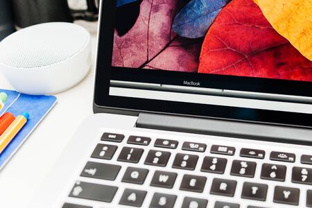 PARIS, FRANCE - MAR 10, 2015: Apple Computers website on MacBook Retina in room environment showcasing new MacBook display as seen on 10 March, 2015のeditorial素材