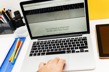 PARIS, FRANCE - MAR 10, 2015: Apple Computers website on MacBook Retina in room environment showcasing new Force Touch trackpad as seen on 10 March, 2015のeditorial素材