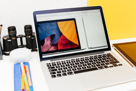 PARIS, FRANCE - MAR 10, 2015: Apple Computers website on MacBook Retina in room environment showcasing MacBook thin specs as seen on 10 March, 2015 with a tilt-shift lensのeditorial素材