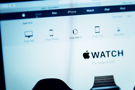 PARIS, FRANCE - MAR 10, 2015: Apple Computers website on MacBook Retina in room environment showcasing Apple Watch pre-rder page  as seen on 10 March, 2015のeditorial素材
