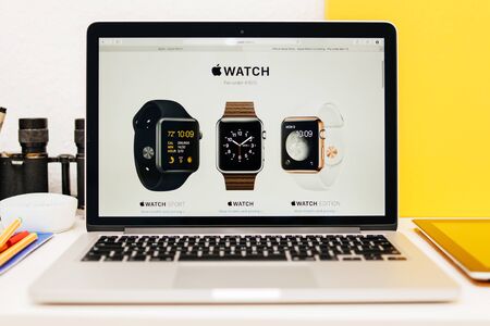 PARIS, FRANCE - MAR 10, 2015: Apple Computers website on MacBook Retina in room environment showcasing Apple Watch Range as seen on 10 March, 2015のeditorial素材