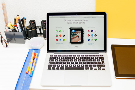 PARIS, FRANCE - MAR 10, 2015: Apple Computers website on MacBook Retina in room environment showcasing Apps for Apple watch as seen on 10 March, 2015のeditorial素材