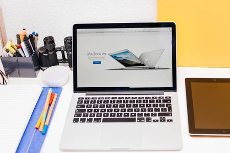 PARIS, FRANCE - MAR 10, 2015: Apple Computers website on MacBook Retina in room environment showcasing MacBook Air as seen on 10 March, 2015のeditorial素材