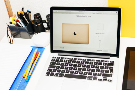 PARIS, FRANCE - MAR 10, 2015: Apple Computers website on MacBook Retina in room environment showcasing what is in the box regarding new MAcBook as seen on 10 March, 2015のeditorial素材