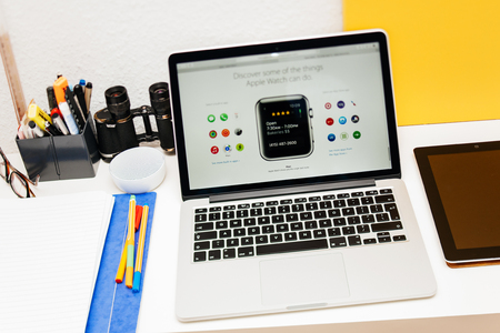 PARIS, FRANCE - MAR 10, 2015: Apple Computers website on MacBook Retina in room environment showcasing Apple Watch app as seen on 10 March, 2015のeditorial素材