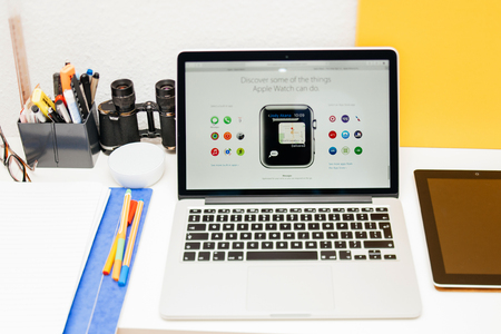 PARIS, FRANCE - MAR 10, 2015: Apple Computers website on MacBook Retina in room environment showcasing Maps on Apple Watch as seen on 10 March, 2015のeditorial素材
