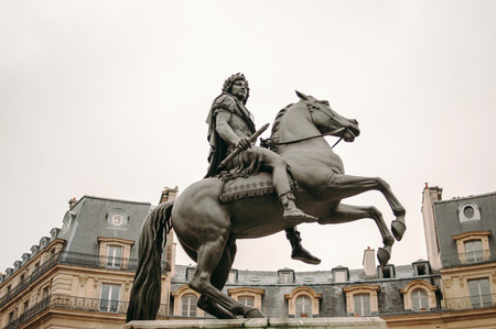 PARIS, FRANCE - JANUARY 23, 2013: Place des Victoires in Paris with the equestrian monument in honor of King Louis XIV, celebrating the Treaties of Nijmegen concluded in 1678-79. Statue was made by Francois Joseph Bosio.のeditorial素材