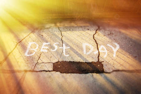 BEST DAY written with chalk on roadsideの写真素材