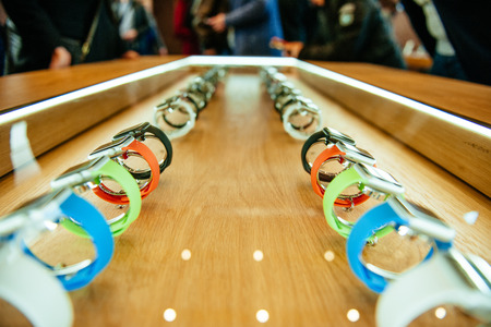 PARIS, FRANCE - APR 10, 2015: Customers sadmiring the Apple Watch smartwatches at Apple Store. The most wanted wearable device will be on sale from April 24 in 9 countries and regionsのeditorial素材