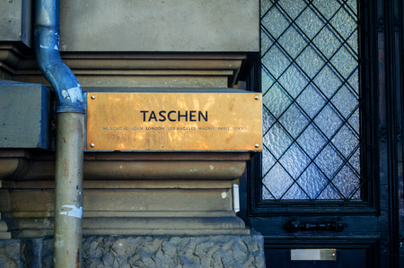 COLOGNE, GERMANY - JUNE 04, 2010: Taschen headquarters signage on Hohenzollernring 53, Cologne, Germany. Taschen is an art book publisher founded in 1980 by Benedikt Taschen in Cologne, Germany.のeditorial素材