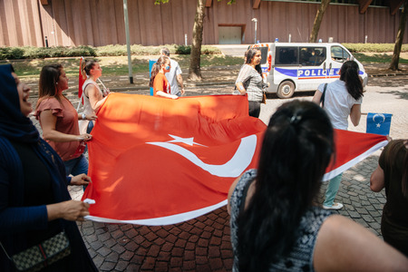 STRASBOURG, FRANCE - JULY 11, 2015: Uyghur human rights activists participate in a demonstration to protest against Chinese government's policy in Uyghurのeditorial素材