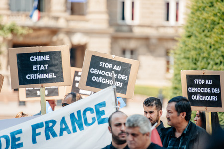STRASBOURG, FRANCE - JULY 11, 2015: Stop Uyghur genocide -  Uyghur human rights activists participate in a demonstration to protest against Chinese government's policy in Uyghurのeditorial素材