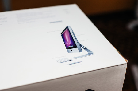 Apple iMac computer in box delivered by courier in home or office environment.のeditorial素材