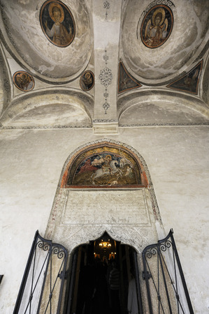 Saint George Church - Bucharest, Romania. This church was erected by Constantine Brncoveanu in 1688 which was decorated with frescoes in 1705. The hotographs represent entrnce to the church with paintings from the upper part of the front verandahのeditorial素材