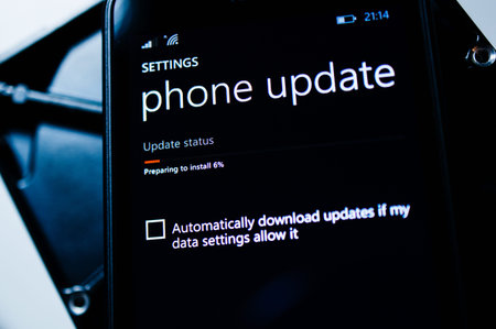 PARIS, FRANCE - JANUARY 19, 2015: Phone Update progress bar on digital display of a Lumia Phone to...