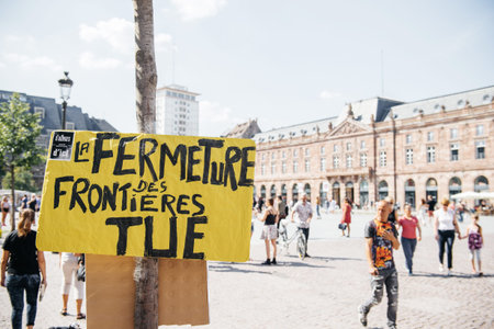 People protesting against immigration policy and border management which asks for commitment in the wake of migrants boat disasters - closing borders killsのeditorial素材