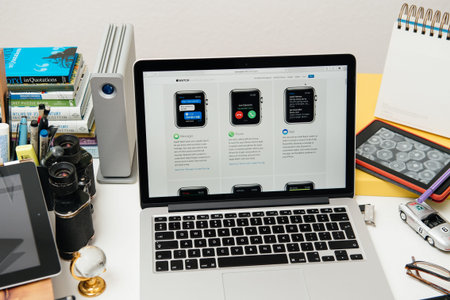 PARIS, FRANCE - SEP 10, 2015: Apple Computers website on MacBook Pro Retina in a creative room...