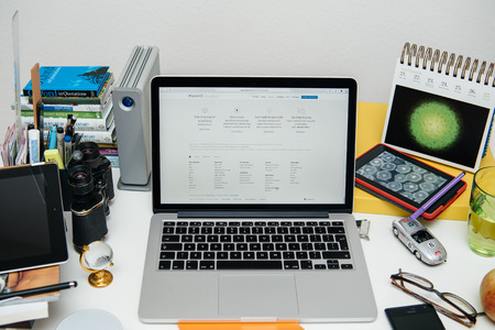 PARIS, FRANCE - SEP 9, 2015: Apple Computers website on MacBook Pro Retina in a creative room environment showcasing the newly announced iPhone 6S preorders date and optionsのeditorial素材