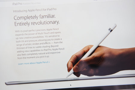 PARIS, FRANCE - SEP 9, 2015: Apple Computers website on MacBook Pro Retina in a creative room...