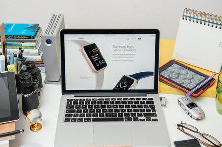 PARIS, FRANCE - SEP 10, 2015: Apple Computers website on MacBook Pro Retina in a creative room environment showcasing the newly announced 7000 series Aluminum body on Apple Watchのeditorial素材