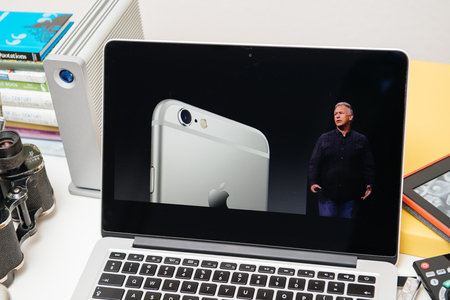 PARIS, FRANCE - SEP 10, 2015: Apple Computers website on MacBook Pro Retina in a creative room environment showcasing the newly announced iPhone 6s with revolutionary cameraのeditorial素材