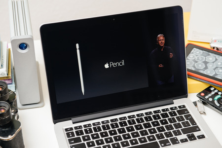 PARIS, FRANCE - SEP 10, 2015: Apple Computers website on MacBook Pro Retina in a creative room environment showcasing the newly announced Apple Pencilのeditorial素材