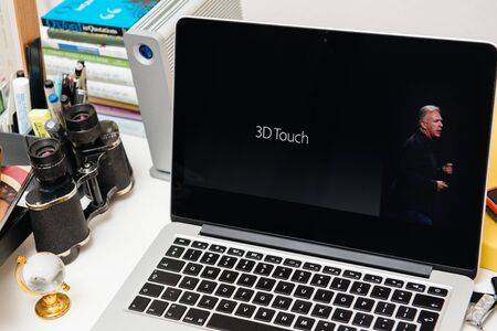 PARIS, FRANCE - SEP 10, 2015: Apple Computers website on MacBook Pro Retina in a creative room environment showcasing the newly announced 3D Touch by Phil Chillerのeditorial素材