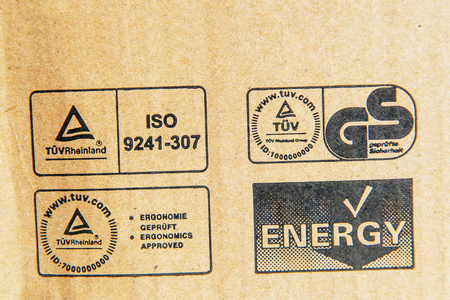 LONDON, UNITED KINGDOM - MARCH 8, 2014: TUV Rheinland, German Stadard, Energy, Iso signs on a computer cardboard boxのeditorial素材