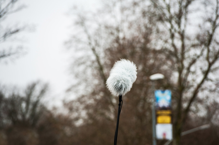 Fur microphone outdoor during live transmission or breaking news eventの写真素材