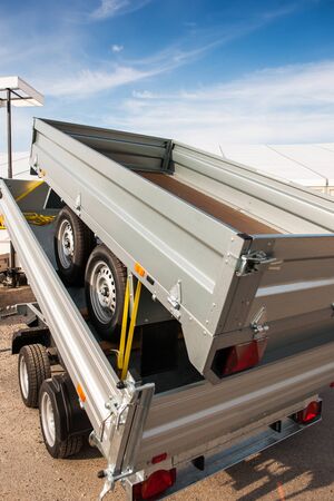Two new metallic trailers transportation ready to buy from dealer or the production factoryの写真素材