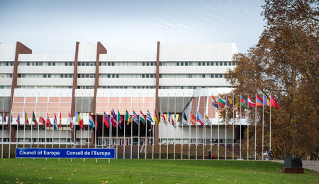 STRASBOURG, FRANCE - 14 Nov 2015: All European Union Flag flies at half-mast in front of the Council of Europe following an terrorist attack in Parisのeditorial素材