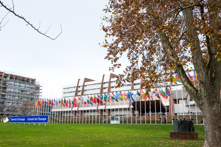 STRASBOURG, FRANCE - 14 Nov 2015: All European Union Flag flies at half-mast in front of the Council of Europe following an terrorist attack in Parisのeditorial素材