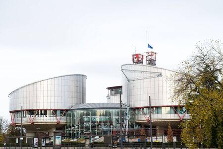 STRASBOURG, FRANCE - 14 Nov 2015: European Union Flag flies at half-mast in front of the European Court of human Rights following an terrorist attack in Parisのeditorial素材