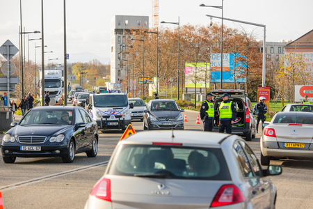 STRASBOURG, FRANCE - NOV 14 2015: French Police checking vehicles on the 'Bridge of Europe' between Strasbourg and Kehl Germany, as a security measure in the wake of attacks in Parisのeditorial素材