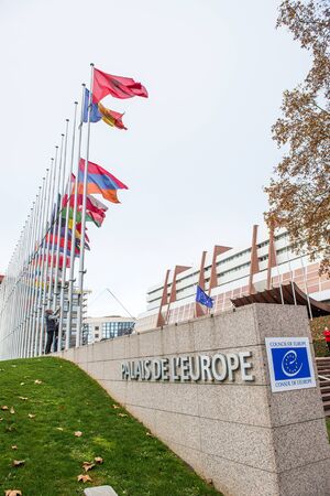 STRASBOURG, FRANCE - 14 Nov 2015: All European Union Flag flies at half-mast in front of the Council of Europe following an terrorist attack in Parisのeditorial素材