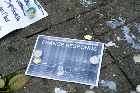 STRASBOURG, FRANCE - NOV 16, 2015: France will reply, Messages, candles and flowers are left around General Kleber statue in memorial for the victims of the Paris Attacks.のeditorial素材