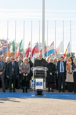 STRASBOURG, FRANCE - NOV 16, 2015: Thorbjorn Jagland - Secretary General of the CE and Council of Europe employees during the minute of silence in tribute to the victims of the attacks in Paris which left at least 129 people deadのeditorial素材