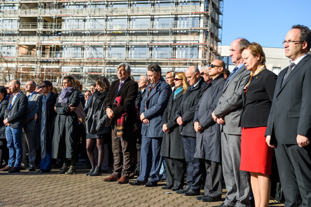 STRASBOURG, FRANCE - NOV 16, 2015: Council of Europe employees  during the minute of silence in tribute to the victims of the attacks in Paris  which left at least 129 people deadのeditorial素材