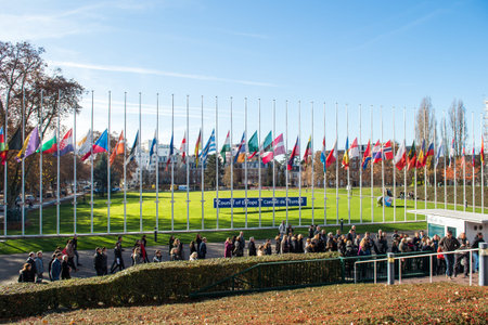 STRASBOURG, FRANCE - NOV 16, 2015: Council of Europe employees  attending the COE building for the minute of silence in tribute to the victims of the attacks in Paris  which left at least 129 people deadのeditorial素材
